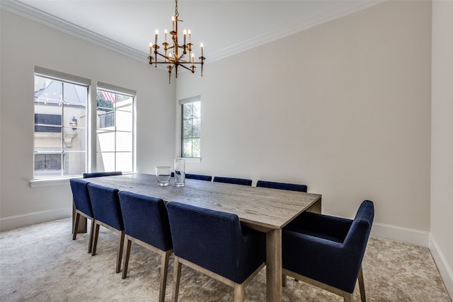 dining area with light colored carpet, ornamental molding, and a notable chandelier