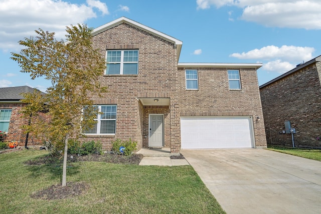 front of property featuring a garage and a front yard