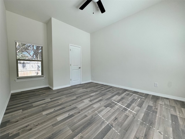 209 Smith St, Hillsboro, TX 76645 - empty room featuring ceiling fan, wood finished floors, and baseboards
