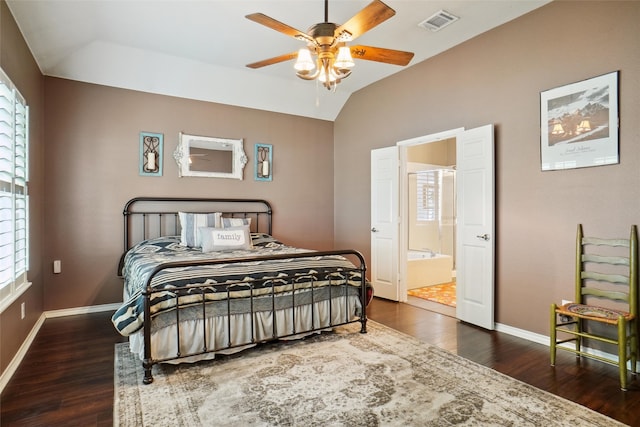 bedroom with dark wood-type flooring, multiple windows, ceiling fan, and vaulted ceiling