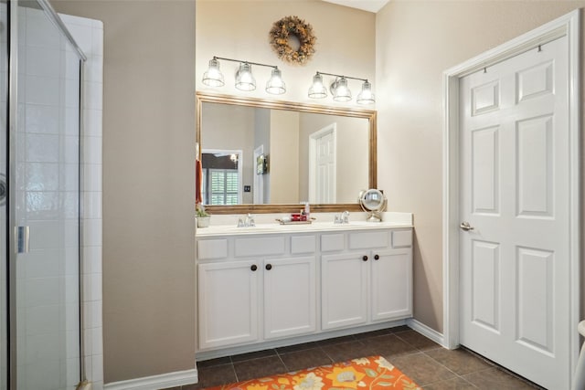 bathroom featuring vanity, an enclosed shower, and tile patterned flooring