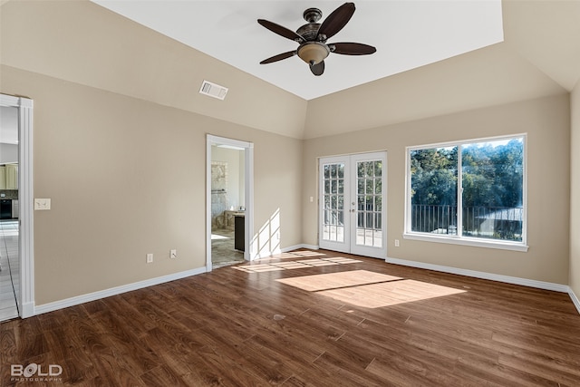 interior space featuring hardwood / wood-style flooring, ceiling fan, vaulted ceiling, and french doors