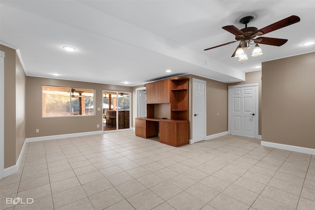 unfurnished living room featuring ceiling fan and light tile patterned flooring