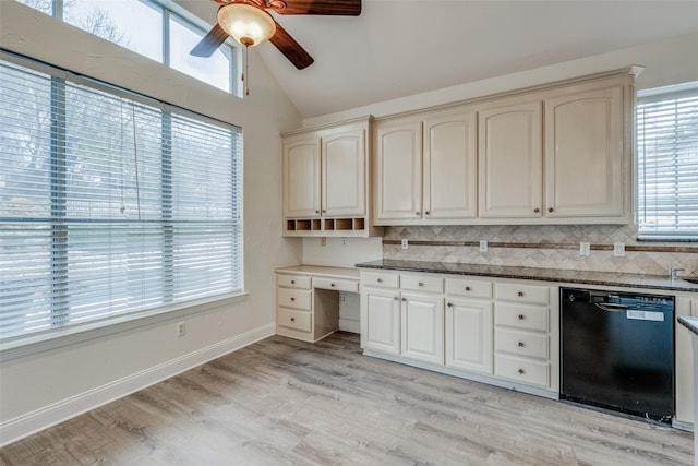 kitchen with dishwasher, decorative backsplash, a wealth of natural light, and light hardwood / wood-style floors