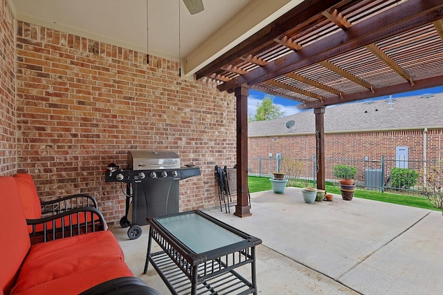 view of patio / terrace with grilling area and a pergola