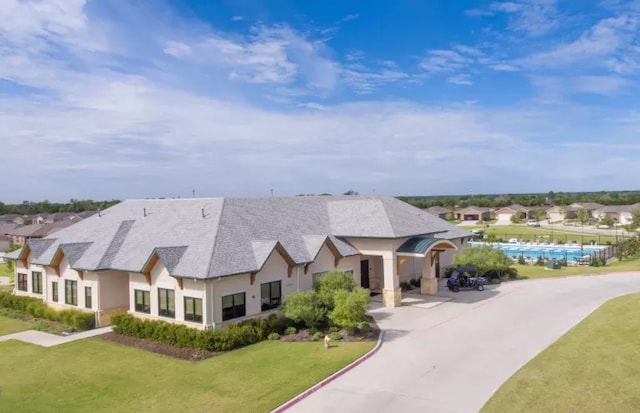 view of front of home with a front yard