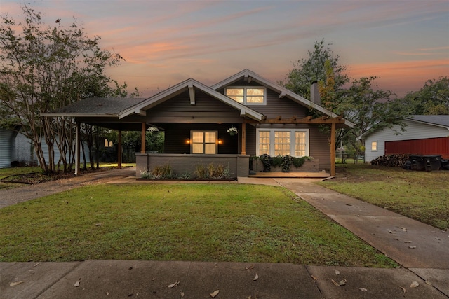 view of front of home with a yard