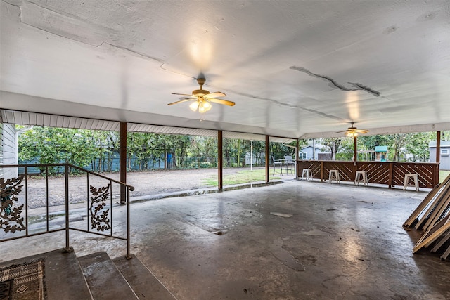 interior space with ceiling fan and a healthy amount of sunlight