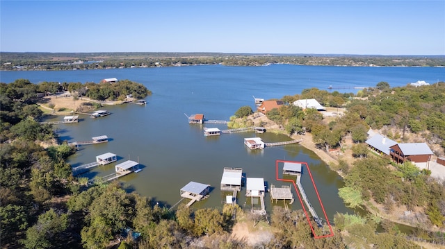 drone / aerial view featuring a water view