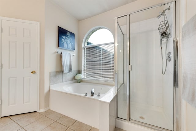 bathroom with tile patterned flooring and plus walk in shower