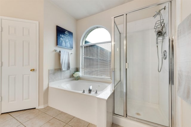 6002 Baldcypress Ct, Garland, TX 75043 - full bathroom with a stall shower, tile patterned flooring, and a garden tub