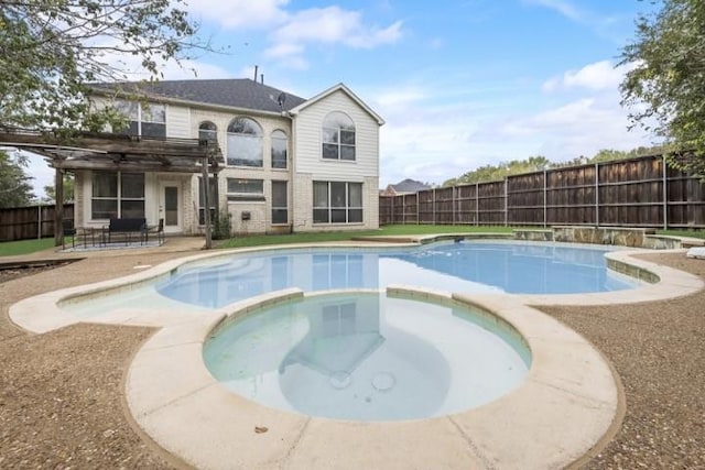 6002 Baldcypress Ct, Garland, TX 75043 - view of swimming pool with a pergola, a fenced backyard, a pool with connected hot tub, and a patio
