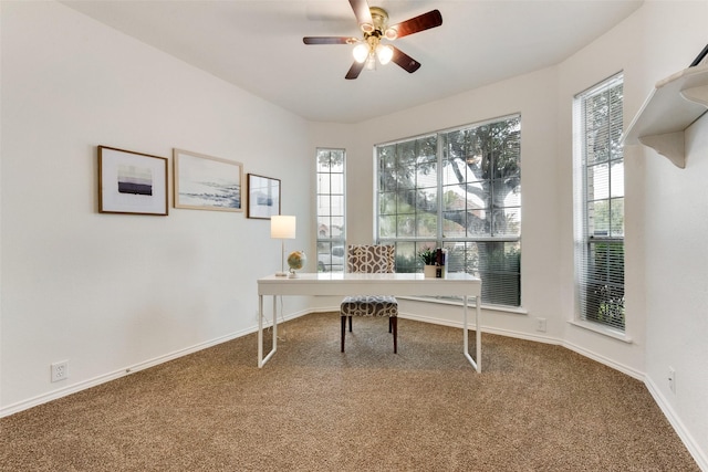 6002 Baldcypress Ct, Garland, TX 75043 - carpeted home office with healthy amount of natural light, ceiling fan, and baseboards