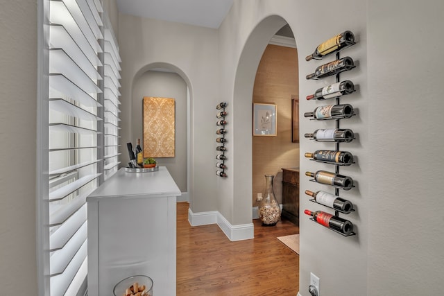 wine area featuring light hardwood / wood-style flooring