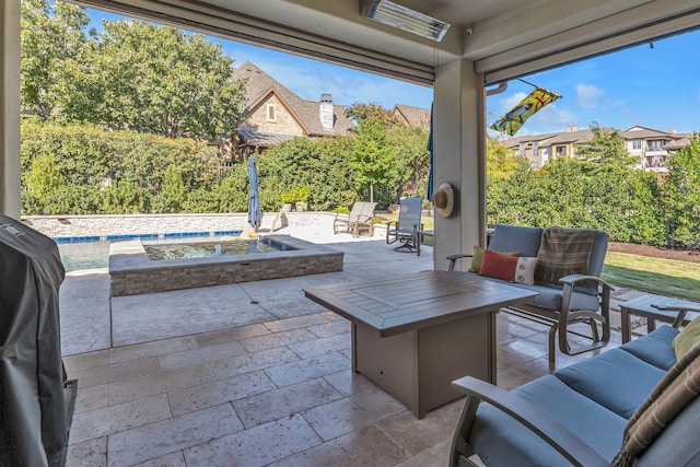 view of patio / terrace featuring a swimming pool and outdoor lounge area