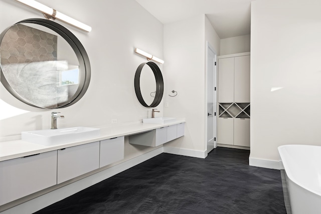 bathroom with a bathing tub and vanity