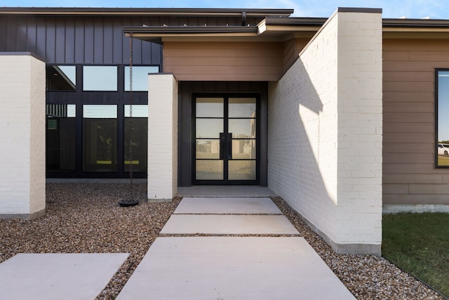 entrance to property featuring french doors