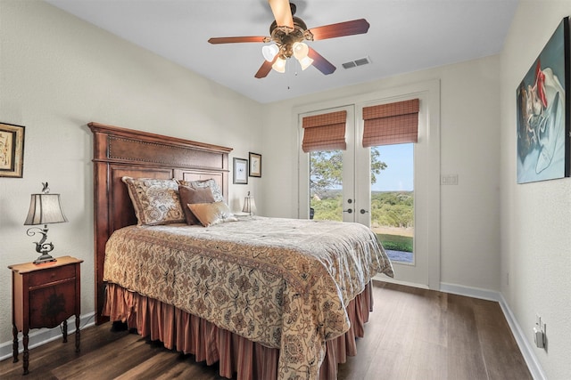 bedroom featuring access to exterior, dark hardwood / wood-style flooring, and ceiling fan