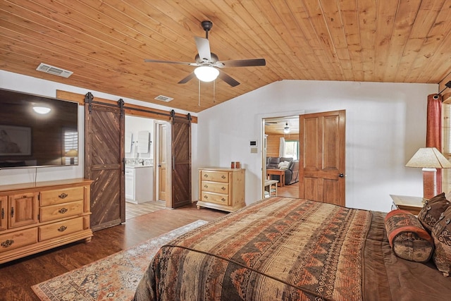 bedroom featuring ensuite bathroom, ceiling fan, a barn door, wooden ceiling, and hardwood / wood-style floors