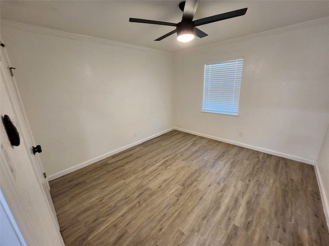 unfurnished room with wood-type flooring, ceiling fan, and crown molding