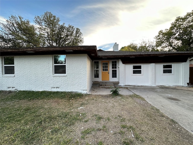 single story home featuring a patio