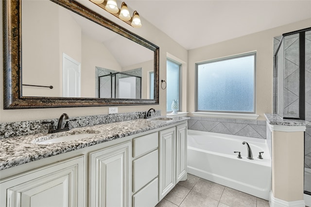 bathroom featuring vanity, tile patterned floors, shower with separate bathtub, and lofted ceiling