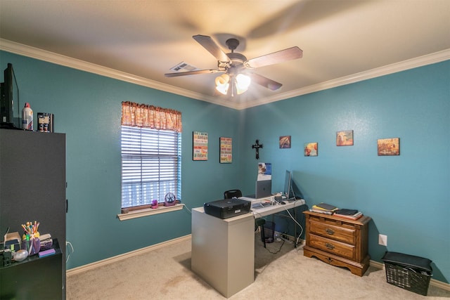 carpeted office space with ceiling fan and crown molding