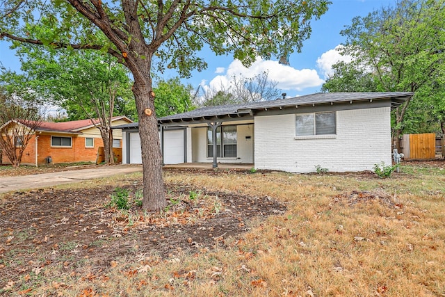 ranch-style home with a garage