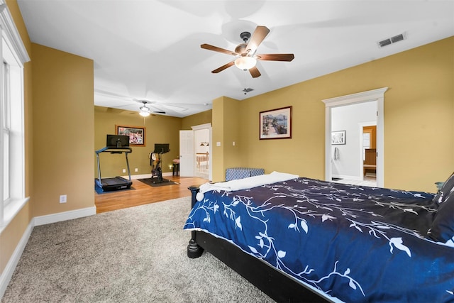 carpeted bedroom featuring ceiling fan