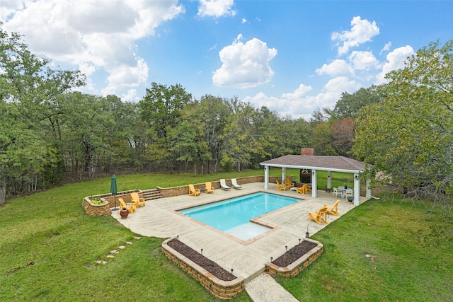 view of pool with a patio, a yard, and a gazebo