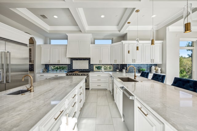 6800 Rainwood Dr, Plano, TX 75024 - kitchen featuring a sink, high quality appliances, coffered ceiling, backsplash, and white cabinets