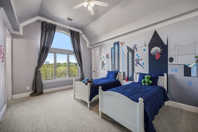 carpeted bedroom featuring ceiling fan and vaulted ceiling