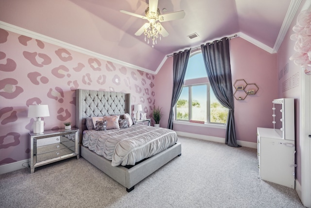 bedroom with ornamental molding, carpet floors, ceiling fan, and vaulted ceiling