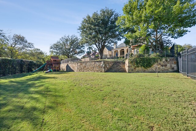 6800 Rainwood Dr, Plano, TX 75024 - view of yard with a playground and stairway