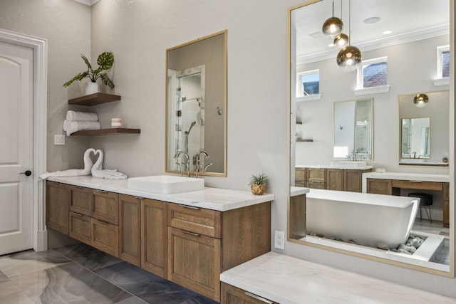 bathroom with vanity, a bathing tub, and crown molding