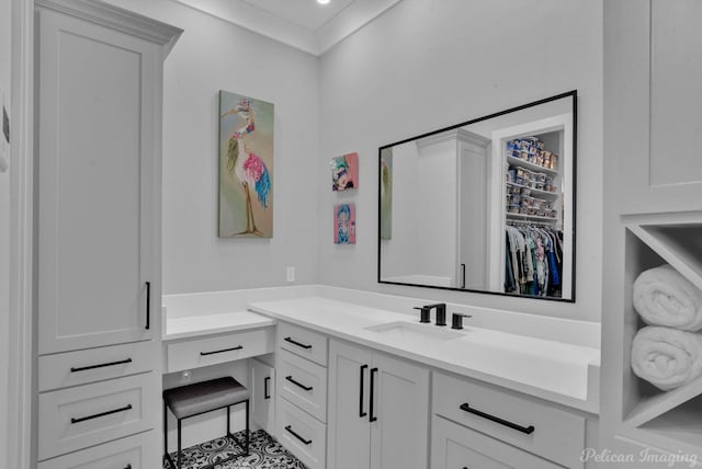 bathroom featuring vanity and ornamental molding