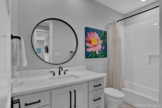 full bathroom with vanity, shower / bath combination with curtain, and toilet