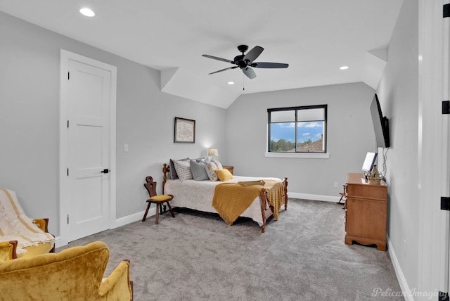 bedroom with carpet flooring, ceiling fan, and lofted ceiling