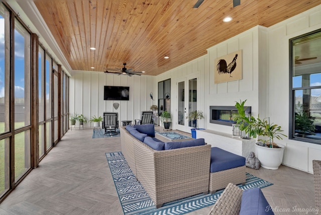 sunroom with wood ceiling