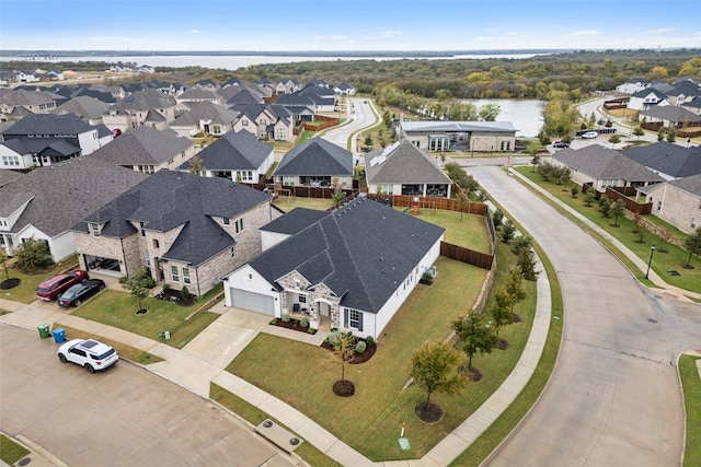 bird's eye view with a water view