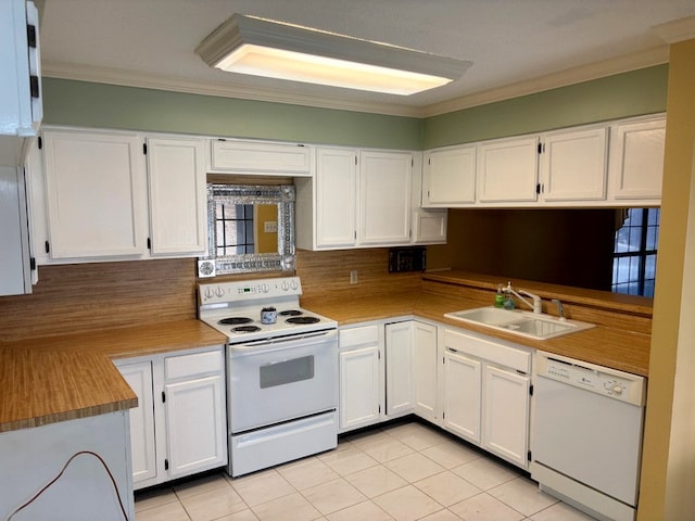 kitchen featuring sink, light tile patterned floors, ornamental molding, white cabinetry, and white appliances