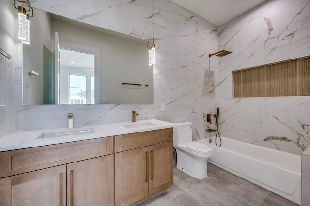 full bathroom with tile walls, vanity, bathing tub / shower combination, and toilet