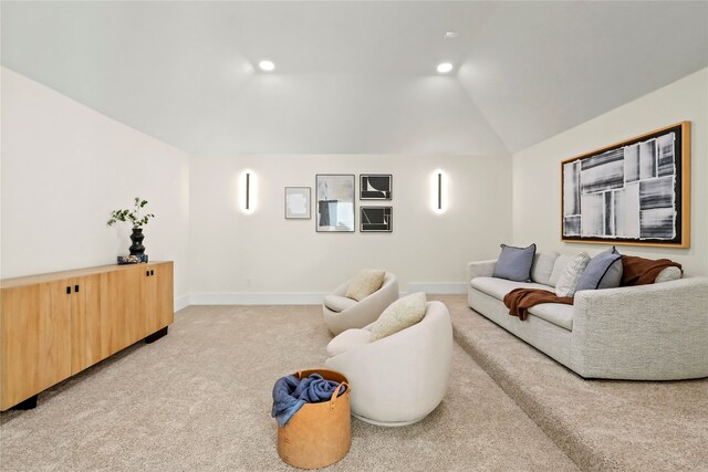 living room featuring light carpet and vaulted ceiling