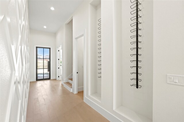 hallway featuring light hardwood / wood-style floors