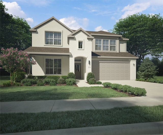 view of front of house featuring a garage and a front yard