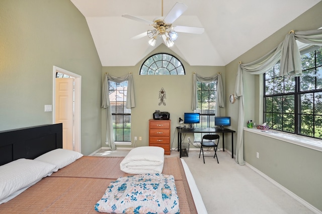 bedroom featuring vaulted ceiling, light carpet, and ceiling fan