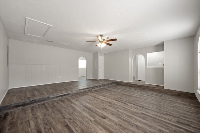 unfurnished room featuring dark hardwood / wood-style flooring and ceiling fan