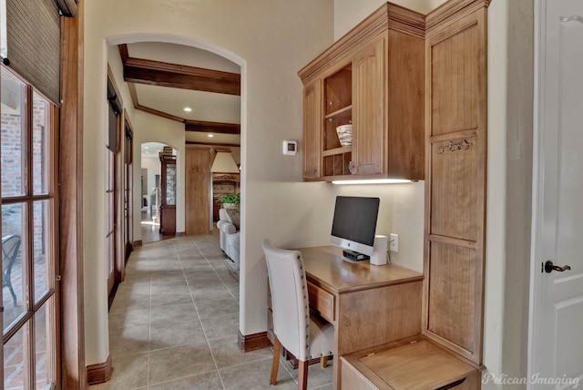 tiled home office with beam ceiling