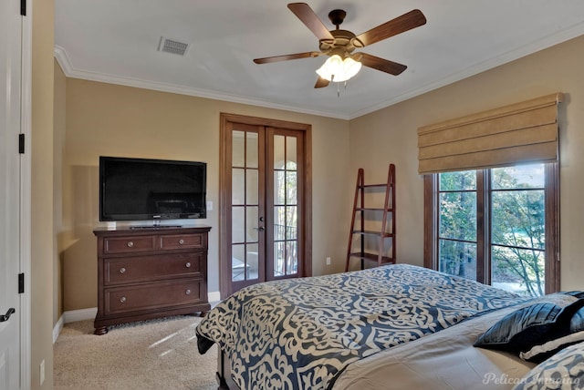 bedroom with french doors, access to outside, light colored carpet, ceiling fan, and crown molding