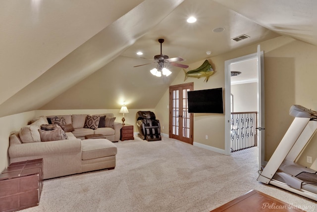 living room featuring lofted ceiling, light carpet, and ceiling fan